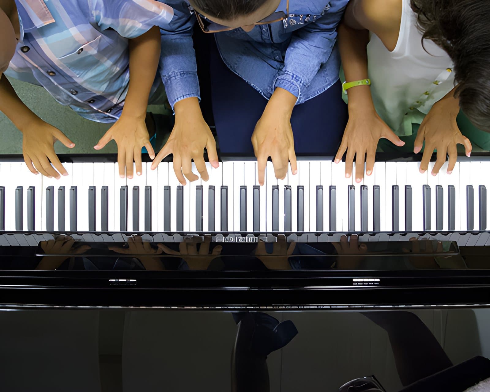 Piano playing, three at once